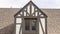 Panorama frame Gabled dormer with decorative windows against brick wall and roof of building