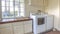 Panorama frame Laundry room in Fallbrook home with white light