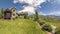 Panorama frame Panorama of the backyard of home with landscaped grassy lawn and lush plants