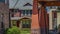 Panorama frame Paved walkway in the middle of houses under blue sky on a sunny day