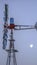 Panorama frame Side view of a windpump with moon and sky in the background