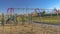 Panorama frame Swings climbing bars and slide at a playground viewed on a sunny day
