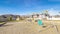 Panorama A-frame swings in a kids playground during day