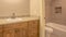 Panorama frame Toilet bathtub and vanity area inside the clean bathroom of a home