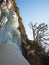 Panorama frozen waterfall at sunset