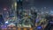 Panorama of futuristic skyscrapers in financial district business center in Dubai night timelapse