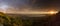 Panorama Gelendzhik Bay at sunset. the photo was taken from a height of the mountain. in the foreground, the Caucasus mountains.