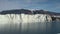 Panorama glacier on border with ocean. Arctic.