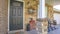 Panorama Glass paned front door and stone brick exterior wall at the facade of a home