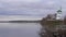 Panorama of gloomy morning on Bank of the Volga river in Yaroslavl region, Russia. Church of the Holy Trinity in village of Dievo