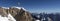 Panorama golden summit cross at Zugspitze, Bavaria, Germany, wintertime