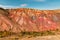 Panorama gorge in mountains. Beautiful Landscape red mountains in cloudy weather. Gorge Martian landscapes. Panorama of desert
