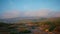 Panorama green hills landscape in morning light. Drone view serene countryside