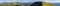 Panorama of green hills in summer mountains with gravel road for