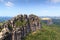 Panorama with Group of rocks Schrammsteine and Falkenstein seen from viewing point in Saxon Switzerland