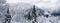 Panorama of Hallstatt Winter snow mountain landscape through the forest in upland valley leads to the old salt mine of Hallstatt