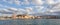 A panorama of the harbor city of Chania. View of the emarald sea, interesting landscapes, colorful houses, a coastline.
