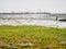 Panorama of harbour, salt marsh and mud flat at low tide of Waddensea on West Frisian island Schiermonnikoog, Netherlands