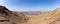 Panorama of Hatta town seen from giant Hatta sign in Hajar Mountains, United Arab Emirates
