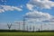 Panorama of high voltage substation. Distribution electrical power. Silhouettes of pylons and towers
