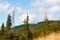 Panorama of hill Lysa hora in misty clouds during sunrise Beskydy Mountains. Transmitter on Lyse mountain. Early morning in Beskid