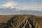 panorama of a hill with repeater antennas and the Majella mountain in the background. Italy