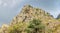 Panorama of the hillside with weathered rocks