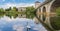 Panorama of the historic bridge and a swan in Limburg an der Lahn