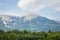 Panorama of the Hochstuhl mount, also called Veliki Stol vrh, between Slovenia and Austria, during a sunset, summit above clouds.