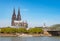 Panorama of the Hohenzollern bridge over Rhine river on a sunny day. Beautiful cityscape of Cologne, Germany