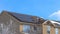 Panorama Home along Wasatch Mountain terrain with solar panels on the pitched roof