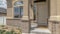 Panorama Home entrance with steps white front door sidelight arched windows and yard