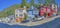 Panorama of homes on a steep street in San Francisco Califronia on a sunny day