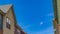 Panorama Houses with balcony and shiny windows against blue sky on a sunny day