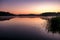 Panorama on huge lake or river in morning with beautiful awesome pink sunrise