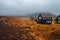 Panorama of Iceland, the harsh weather, mountains and black house