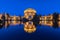 Panorama with the illuminated Palace of Fine Arts near Golden Gate Bridge during the blue hour at sunset in San Francisco