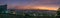 Panorama image of beautiful evening sky in the city. Can be used as background.