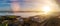 Panorama image of Galway bay and port at sunset. Railway to town center. Warm sun glow.Burren mountains in the background, Hare