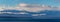 panorama image of the Olympic mountains of Washington State with Puget