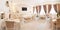 Panorama. Interior in restaurant. Beige, tables