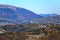 Panorama of the italian mountains with the town of Asiago in aut