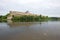 Panorama of the Ivangorod Fortress and the Narva River on a cloudy August day. Ivangorod, Russia