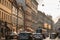 Panorama of Jindrisska street in Prague Old Town at sunset in fall with tram passing by stuck in a traffic jam.