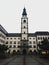 Panorama of Klagenfurt Cathedral Dom catholic church exterior facade bell clock tower Domplatz square Carinthia Austria