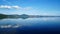 Panorama of Lake Bracciano in Roma of Italy. Mountains reflecting on the lake