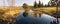 Panorama of lake in forest at morning time. Clean rural environment