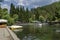 Panorama of lake Kleptuza toward karst spring and varied plant