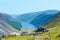 Panorama of Lake Lough Tay or The Guinness Lake. County Wicklow, Wicklow Mountains National Park, Ireland.