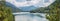 Panorama of a lake in the mountains at the border of Austria and Germany.